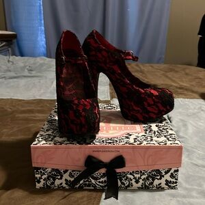 Gently used red and black lace Bordello heels